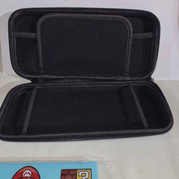 The PDP Slim Travel Deluxe Case is a travel case designed for the Nintendo Switc - Picture 5 of 10